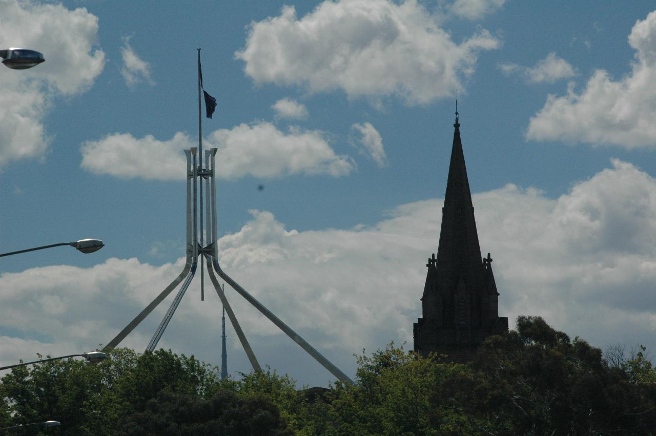 Parliament House flag pole and St. Mark's Cathedral spire, from Canberra Avenue