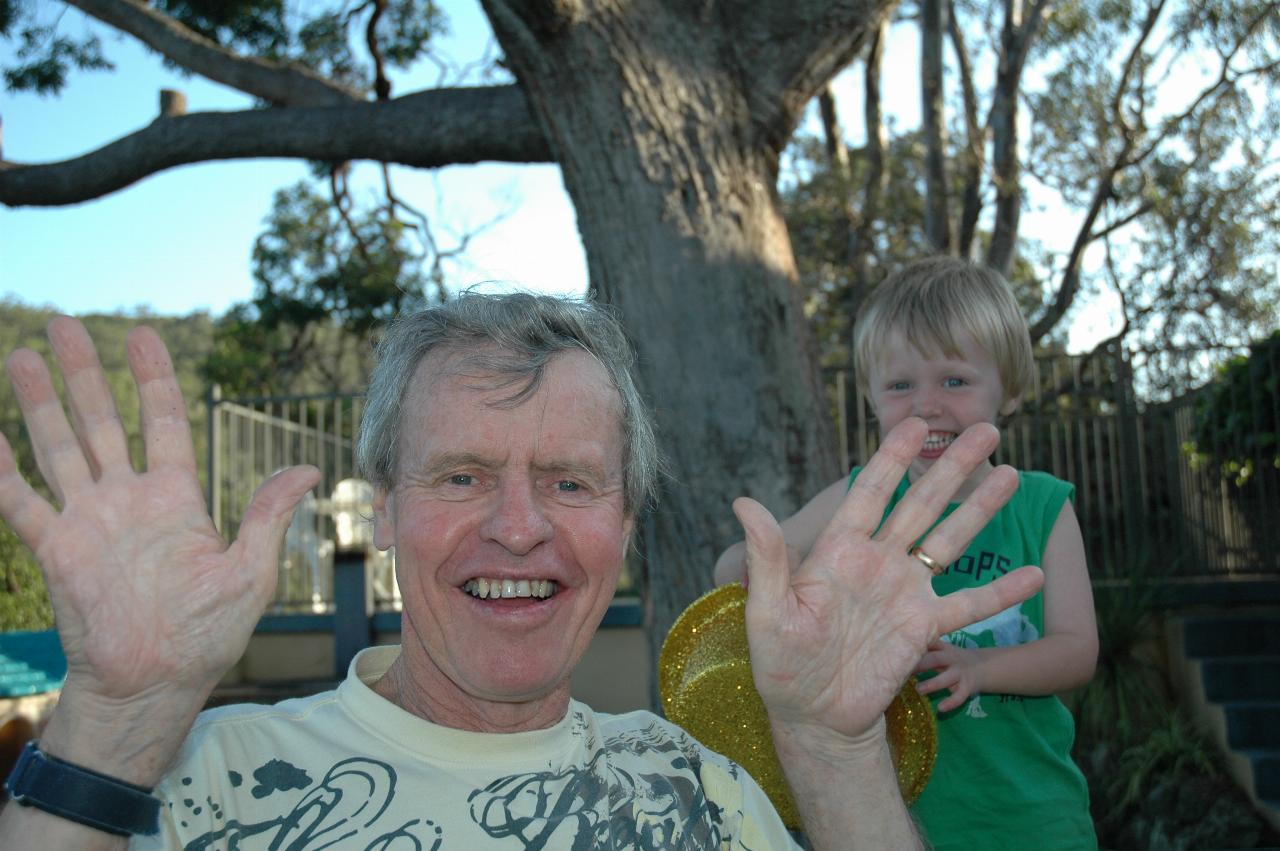 Flynn's third birthday: Peter in happy mood, with Flynn and birthday hat