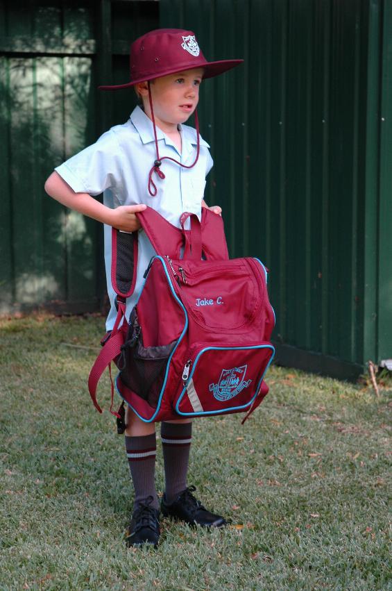 Jake holding school bag