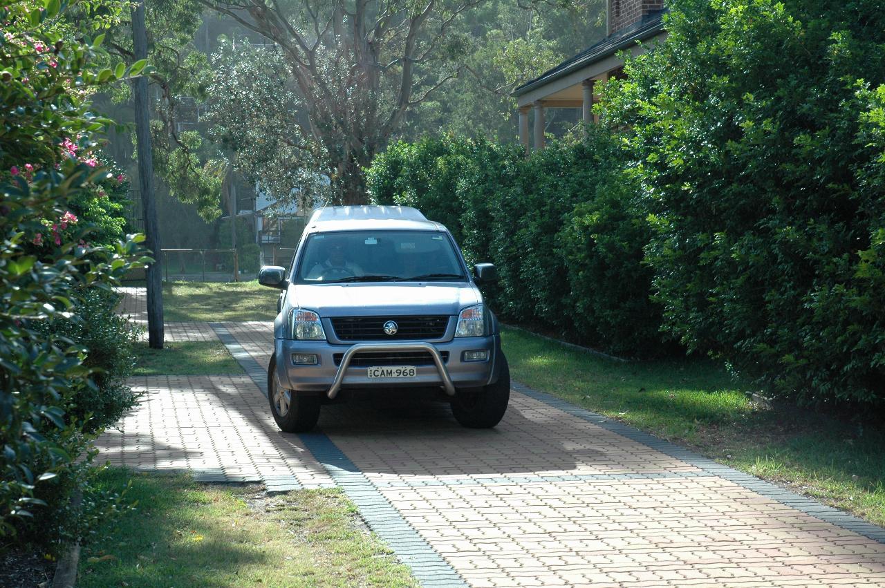 Cam's car coming down driveway