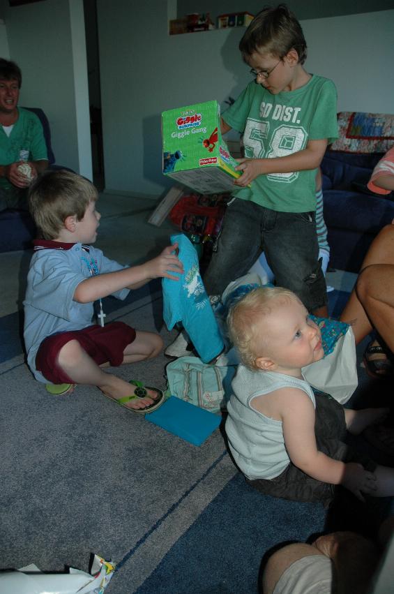 Cooper's First Birthday: Jake, Tynan and Cooper with presents