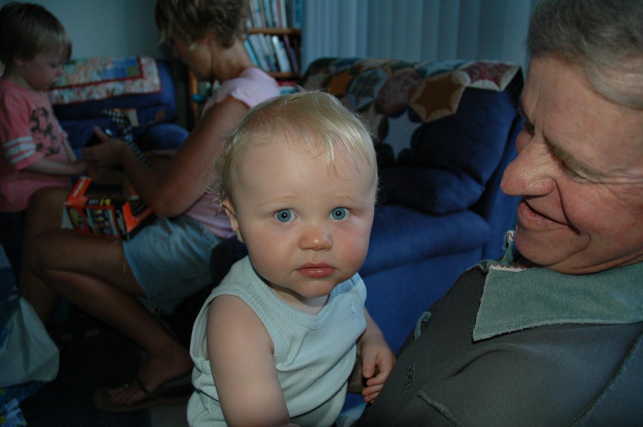 Cooper's First Birthday: A pensive Cooper in Peter's arms