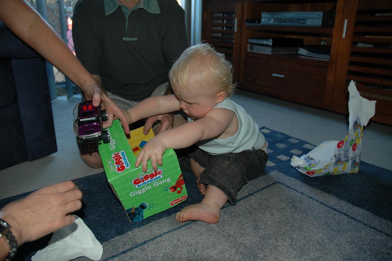 Cooper's First Birthday: Cooper with his present, still in box