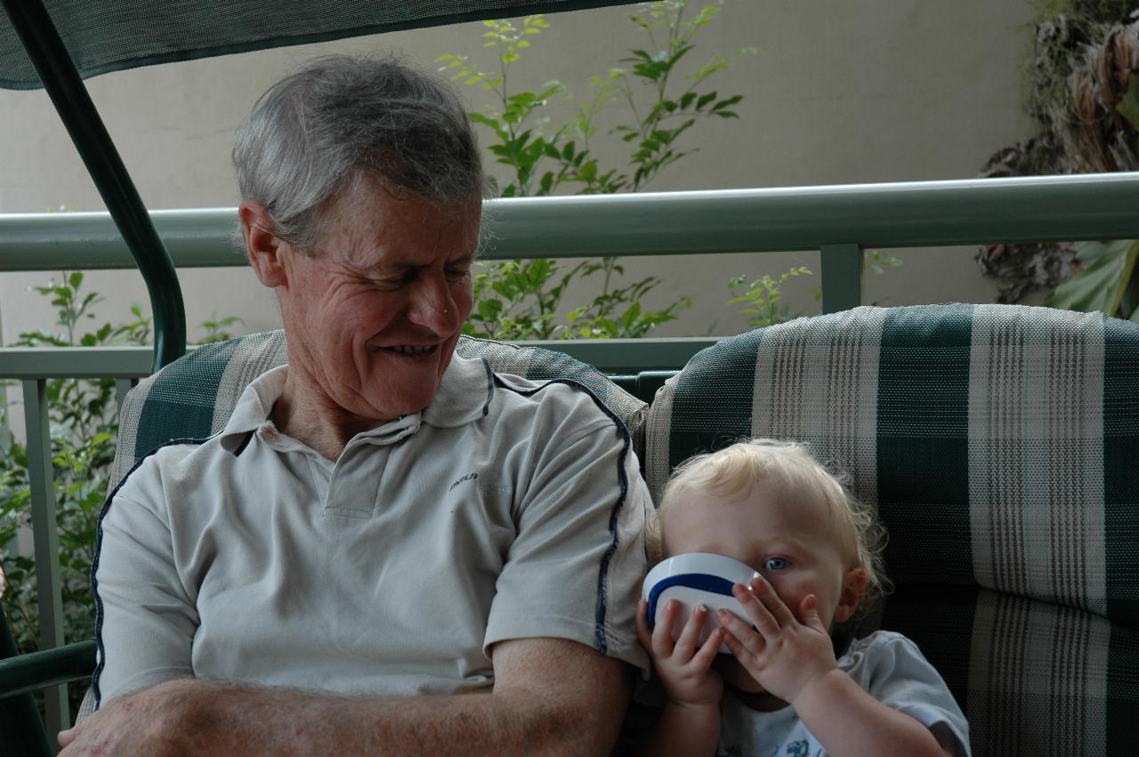 Family Dinner: Cooper (and Peter) with food on swinging seat