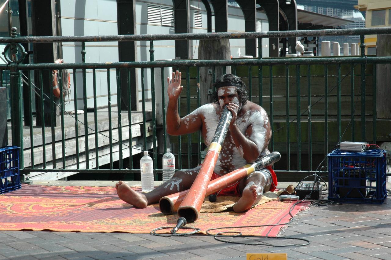 Luna Park Day: Aboriginal player at Circular Quay showing how to play the digeridoo