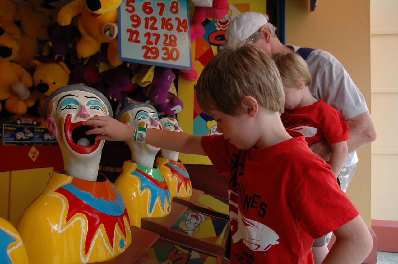 Luna Park Day: Jake and Flynn with the laughing clowns