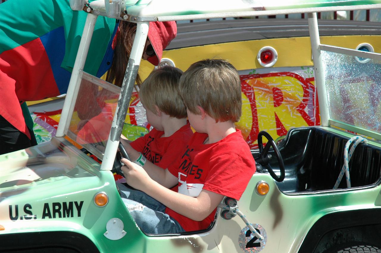 Luna Park Day: Flynn being strapped in by the attendant