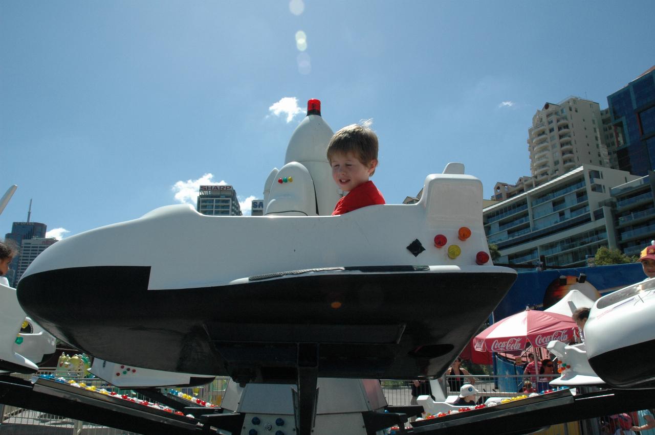 Luna Park Day: Jake flying high on the Space Shuttle ride