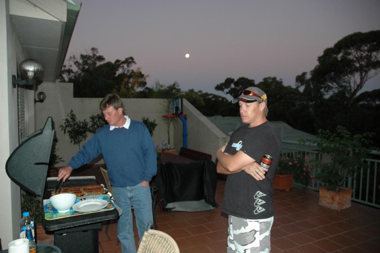 Peter's 66th Birthday: Cameron and Glenn cooking for birthday, full moon rising