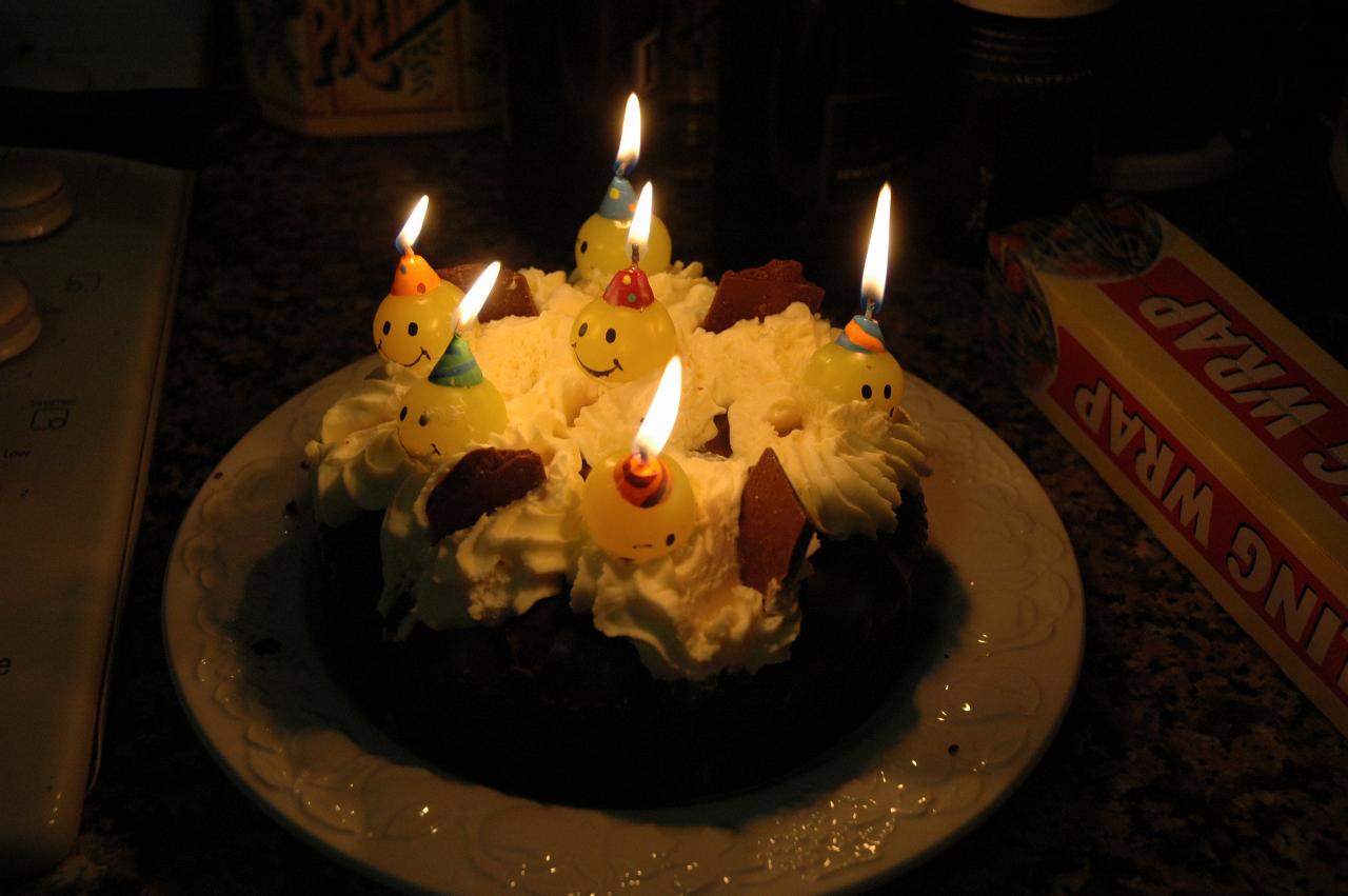 Peter's 66th Birthday: The Cake, with smiley face candles