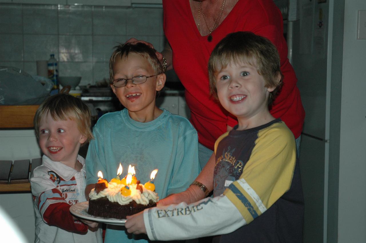 Peter's 66th Birthday: Flynn, Tynan and Jake helping Yvonne bringing in the birthday cake