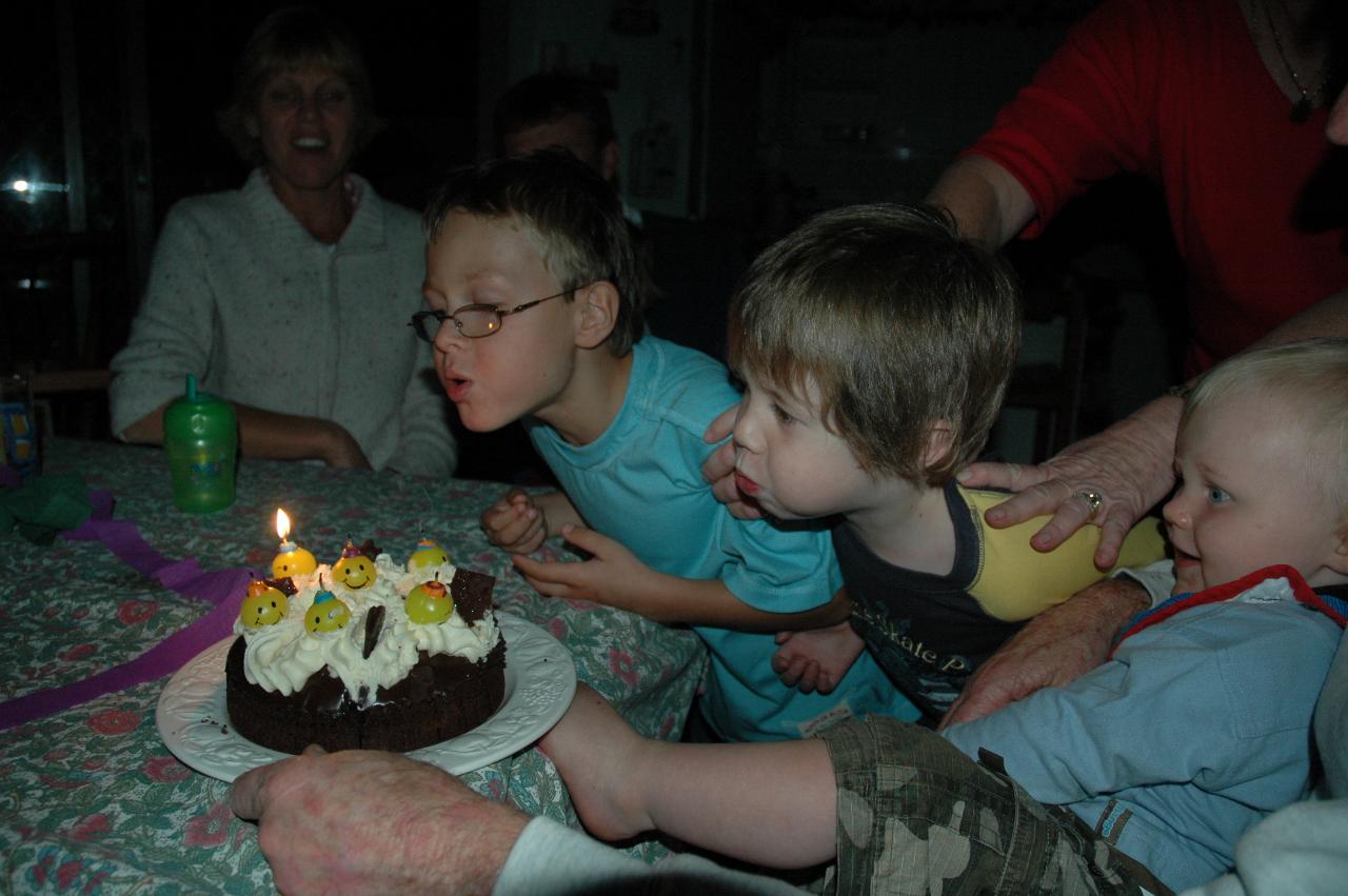 Peter's 66th Birthday: Tynan and Jake blowing out the candles