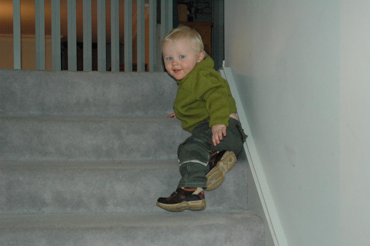 Baby descending from top of stairs