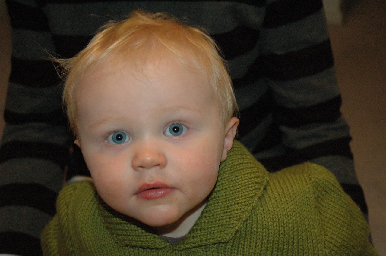 Baby staring at camera, full face image