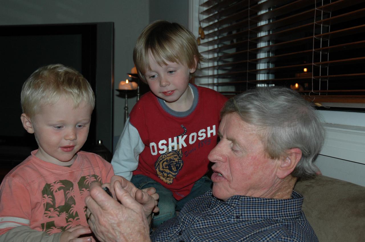 Glenn Wallace 39th birthday: Peter showing phone photo for Cooper and Flynn