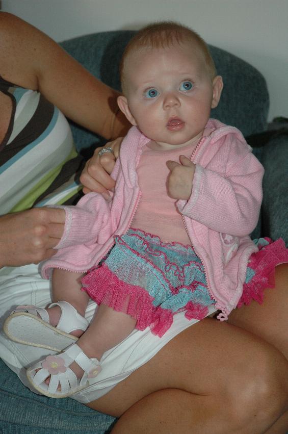 Christmas dinner at Illawong: Kelly with Lily in her tutu