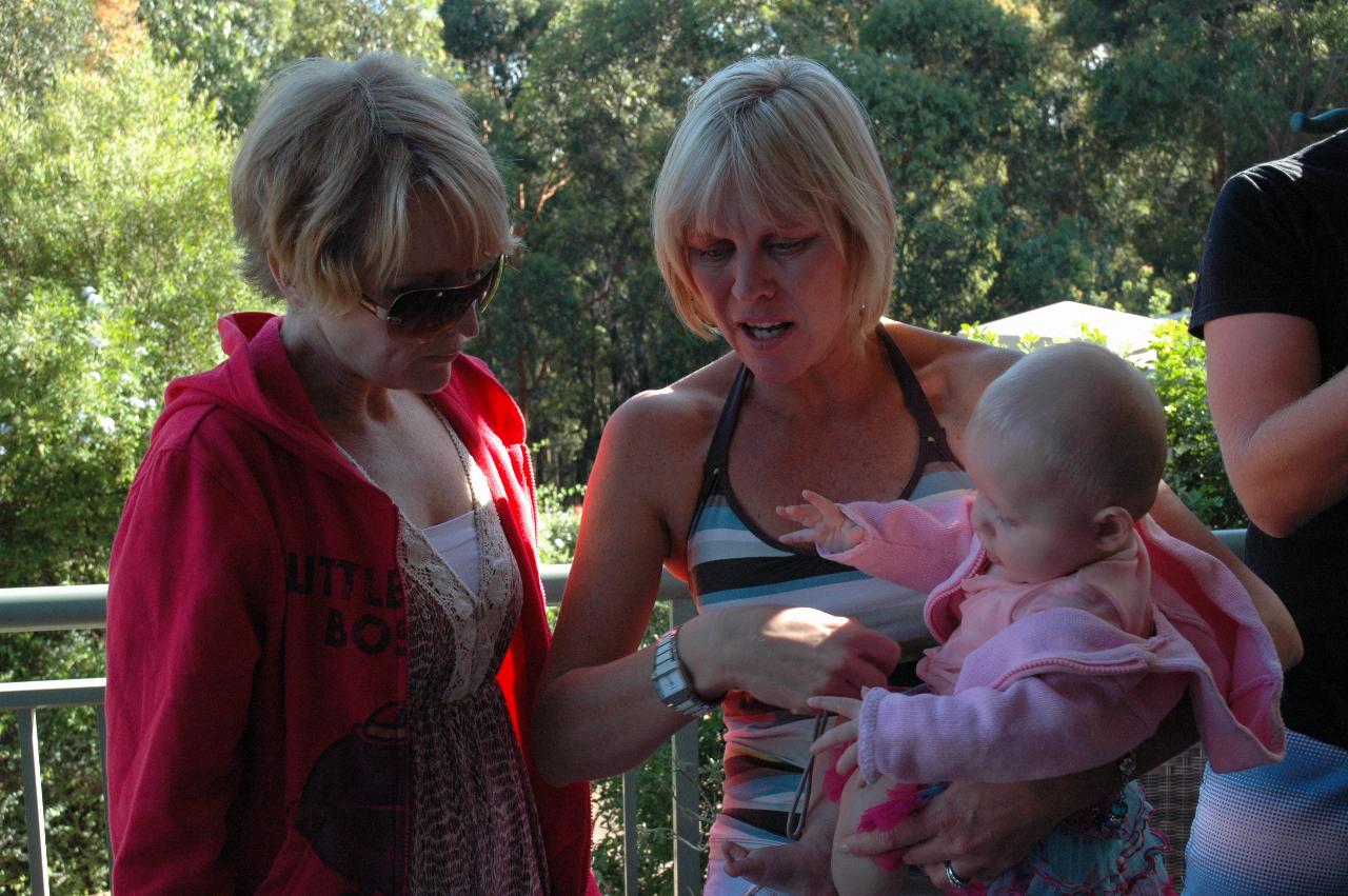 Christmas dinner at Illawong: Michelle and Kelly with Lily on Illawong verandah