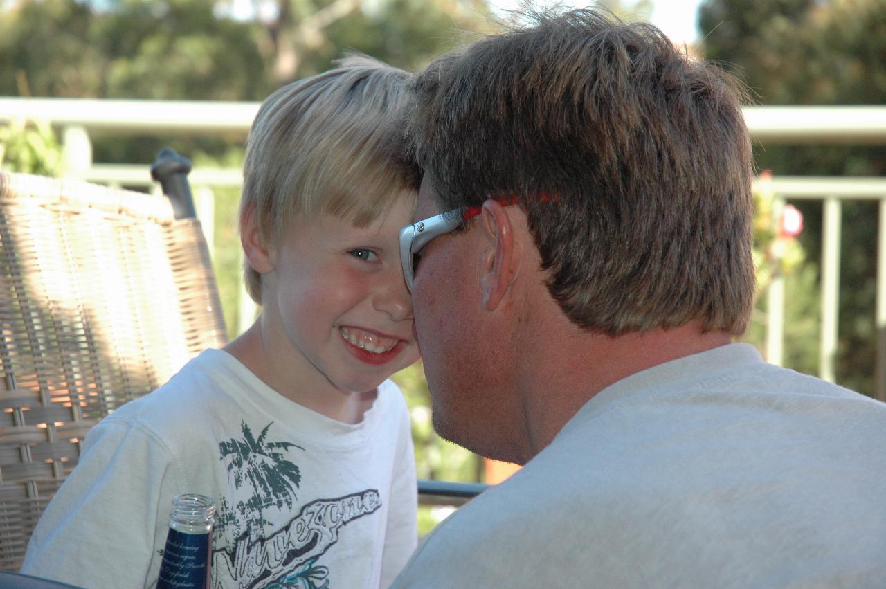 Christmas dinner at Illawong: Father and son: Cameron with Flynn