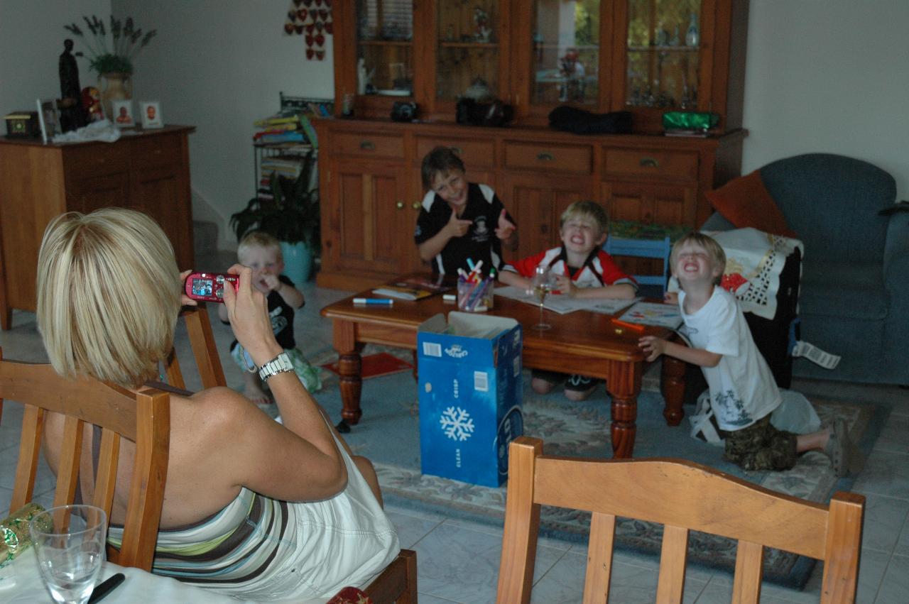 Christmas dinner at Illawong: Kelly photographing the boys