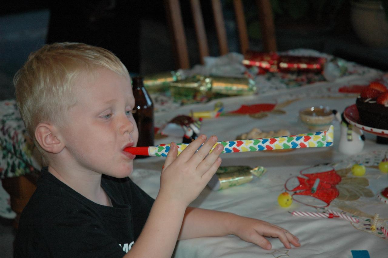 Christmas dinner at Illawong: Cooper blowing his streamer