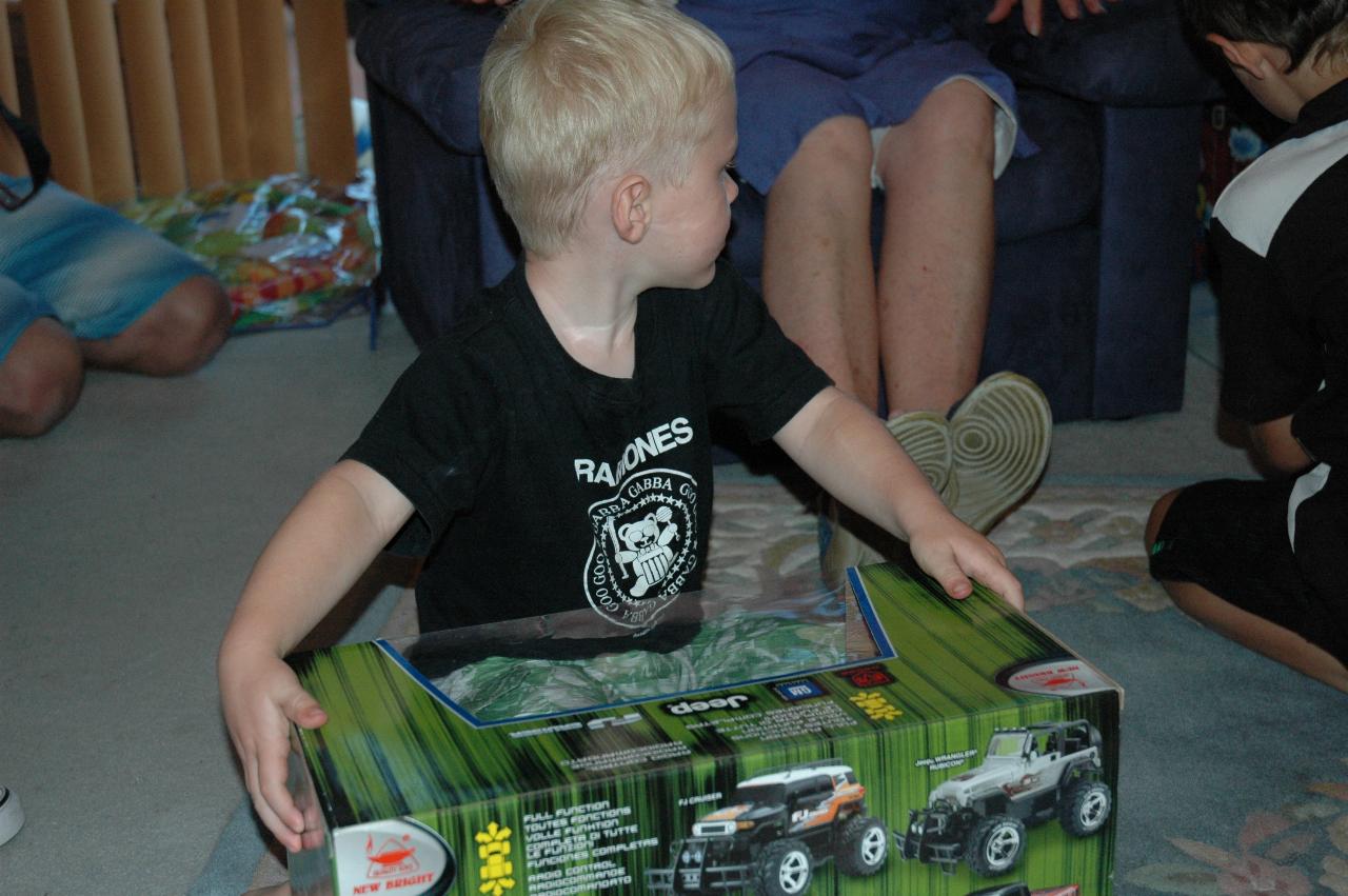 Christmas dinner at Illawong: Cooper's radio controlled car is almost as big as he is