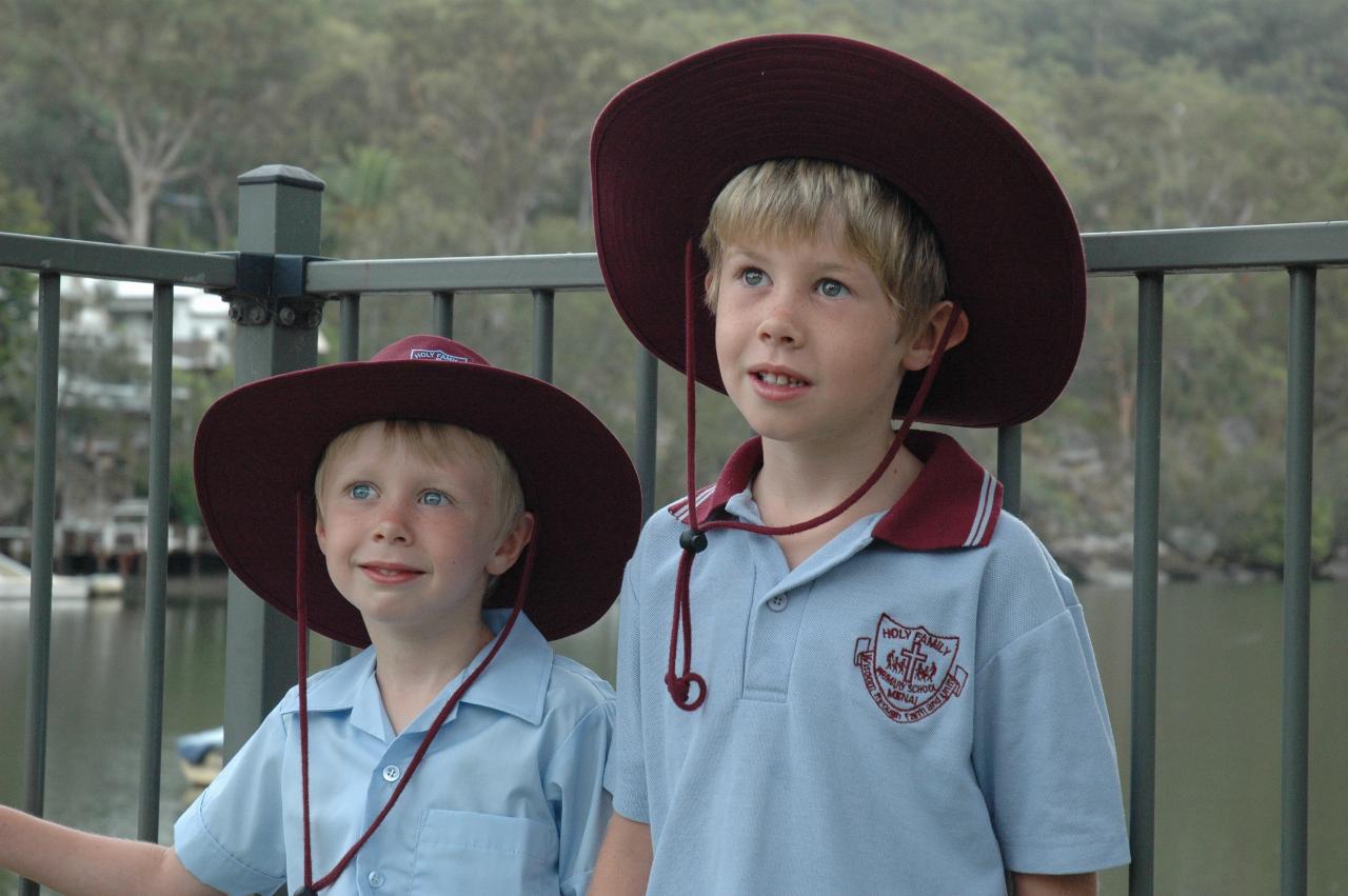 Jake and Flynn wearing school hat