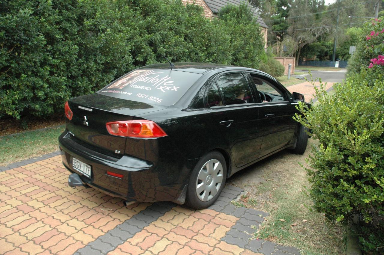 Michelle's car leaving down the driveway