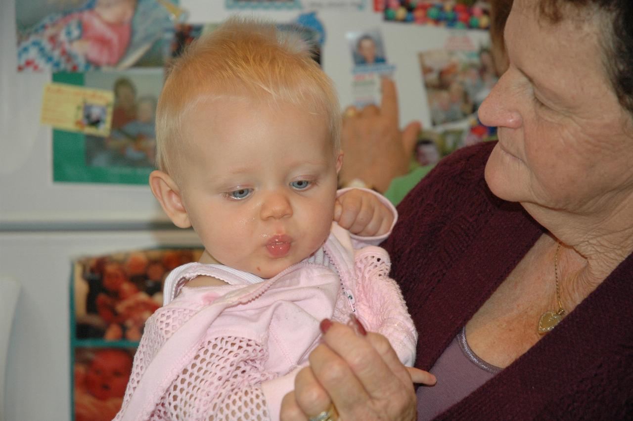 Cooper's 3rd birthday: Lily and Cecelie - Lily loves food too