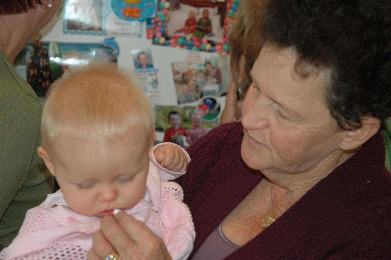 Cooper's 3rd birthday: Lily and Cecelie - Lily loves food too