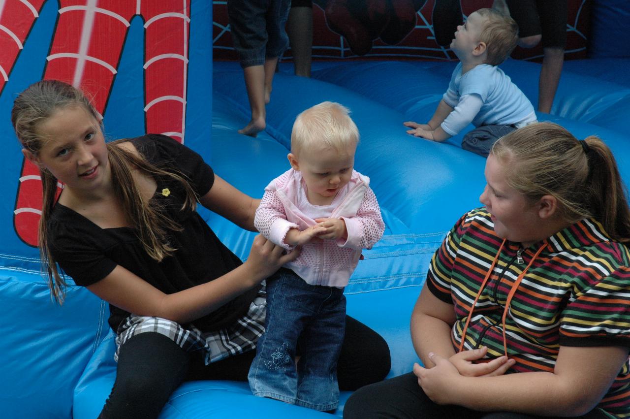 Cooper's 3rd birthday: Lily with some carers at the air castle