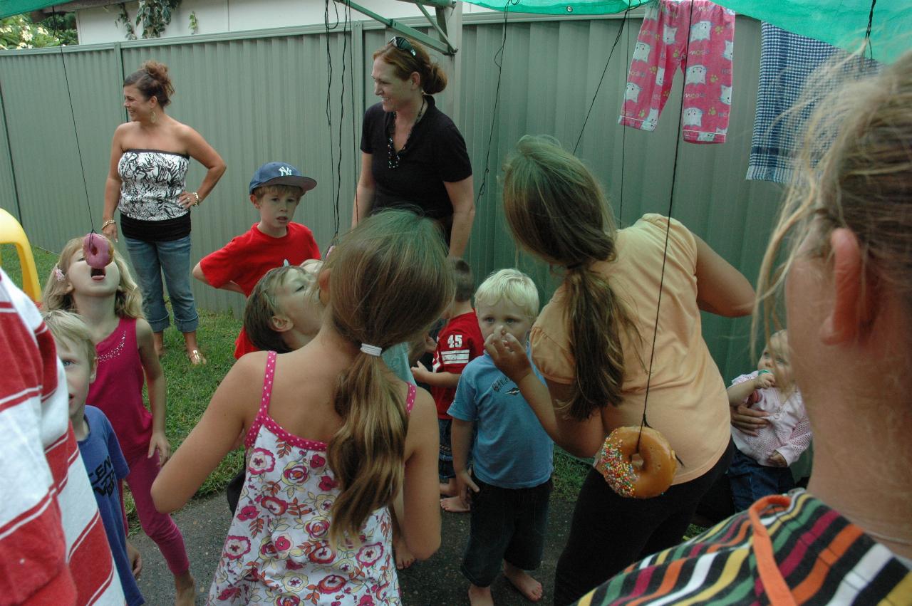 Cooper's 3rd birthday: Donut on a string contest getting under way