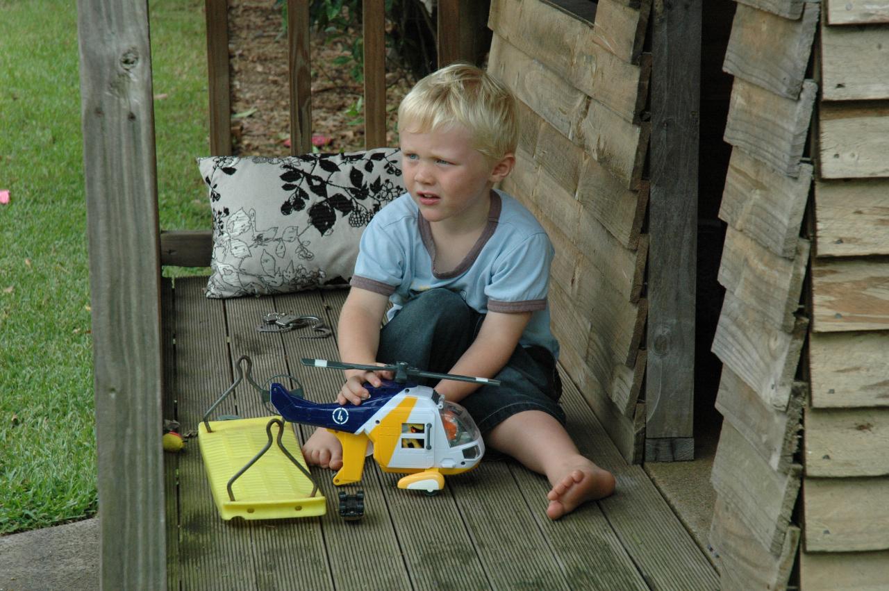 Cooper's 3rd birthday: Cooper with a helicopter toy