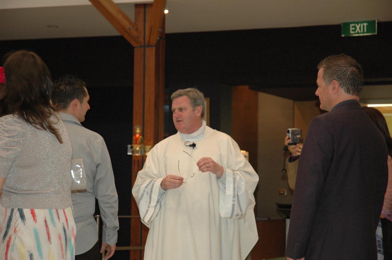 Lily's Baptism: Father Glen preparing for the Baptims