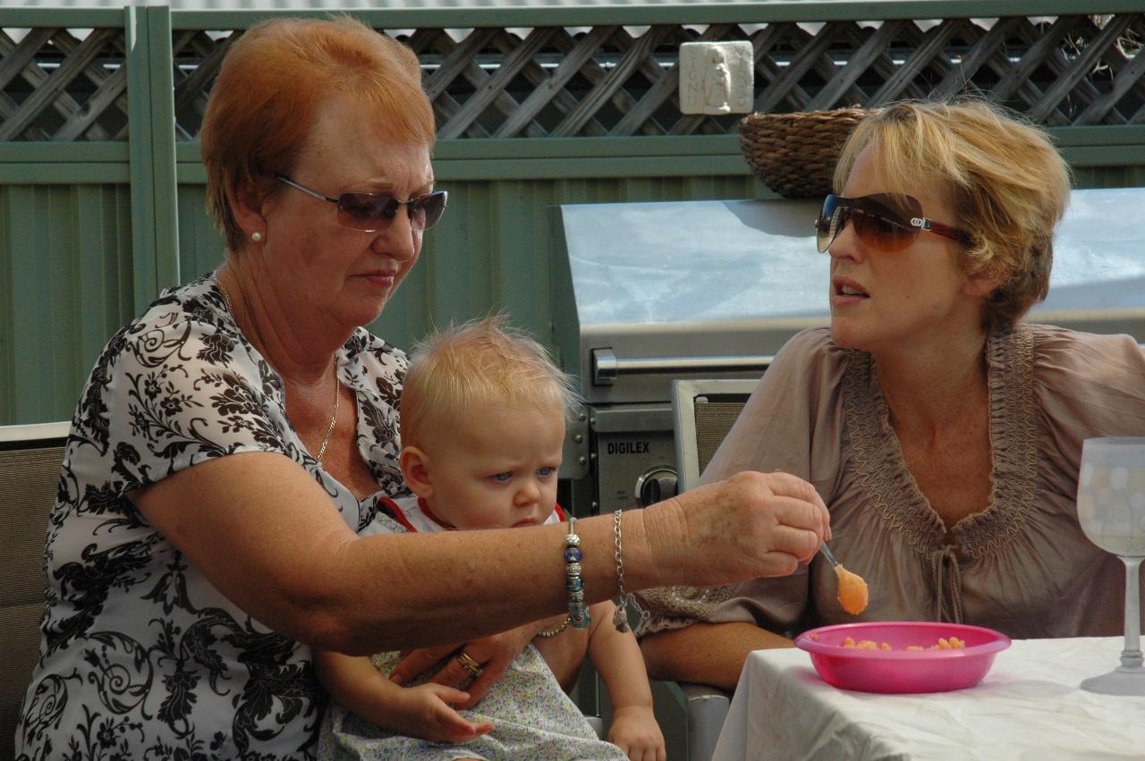 Lily's Baptism: Yvonne feeding Lily