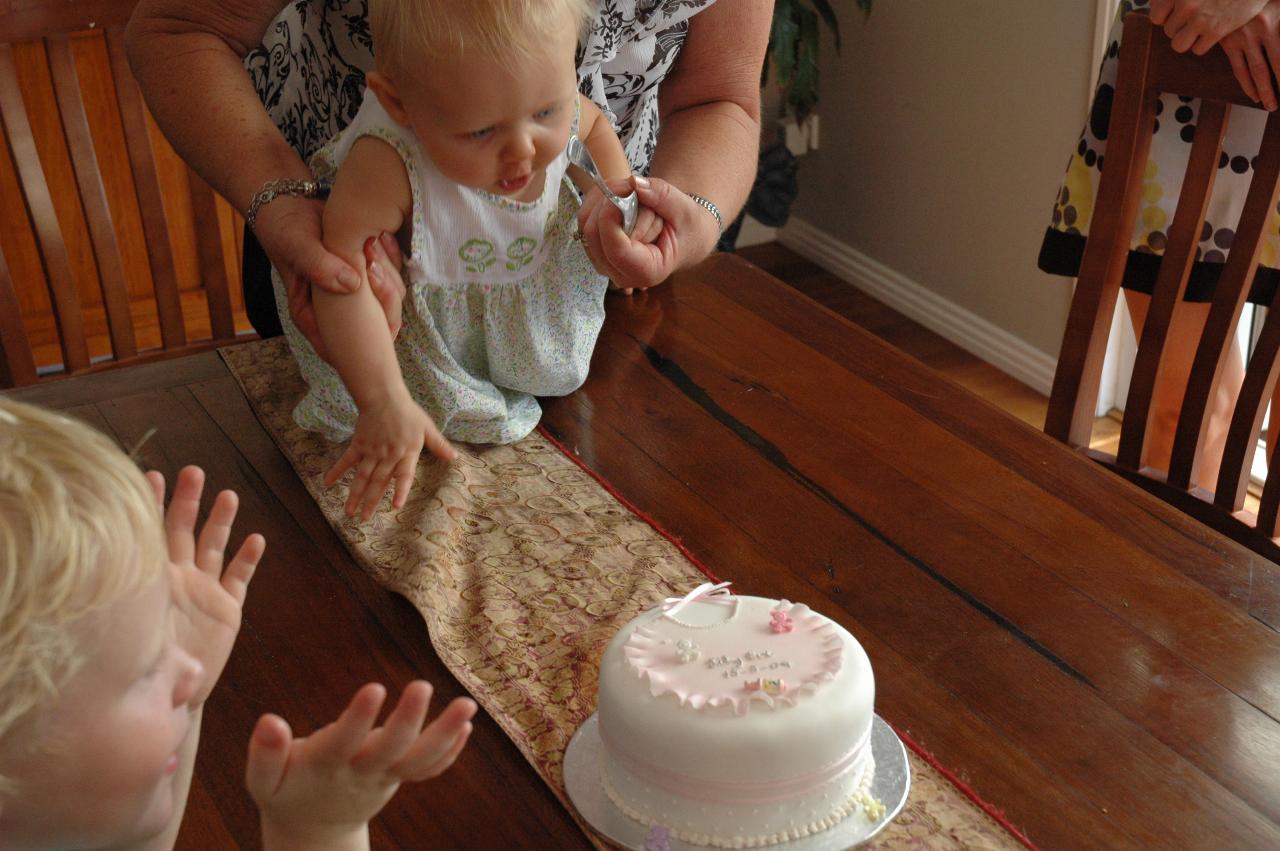 Lily's Baptism: Lily and the cake, with Cooper wanting to sing \