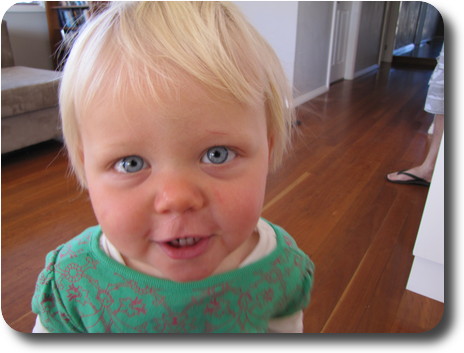 Wide angle lens distortion - big nose on close up of little girl