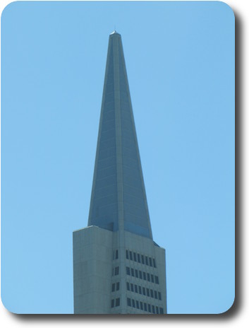 Close up view of top of pyramid shaped building