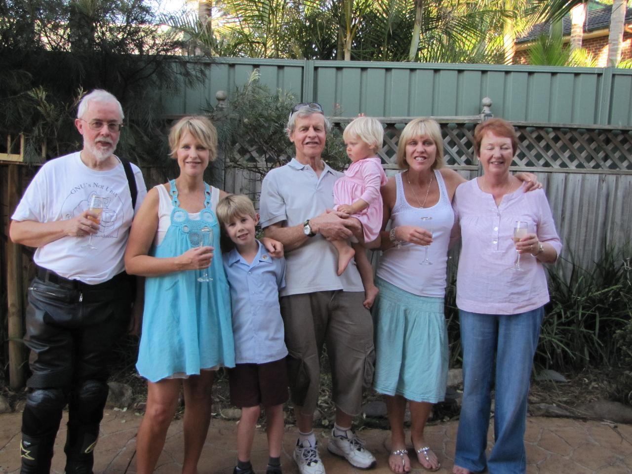 Family gathered in back yard