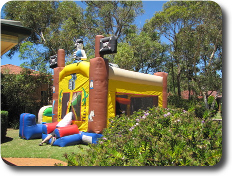 Large, inflatable jumping structure, shaped like a small shed