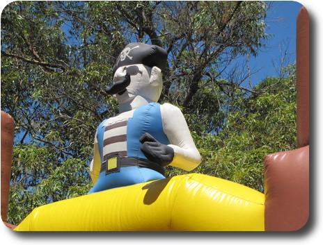 An exaggerated pirate on the front of the jumping castle