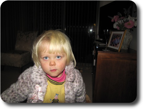 Little girl with dark background