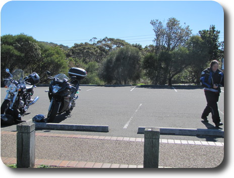 Two motorcycles, front one, photographer walking off to left