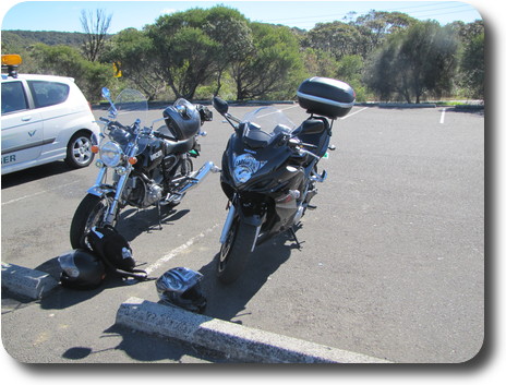 Front view, 2 black motorcycles