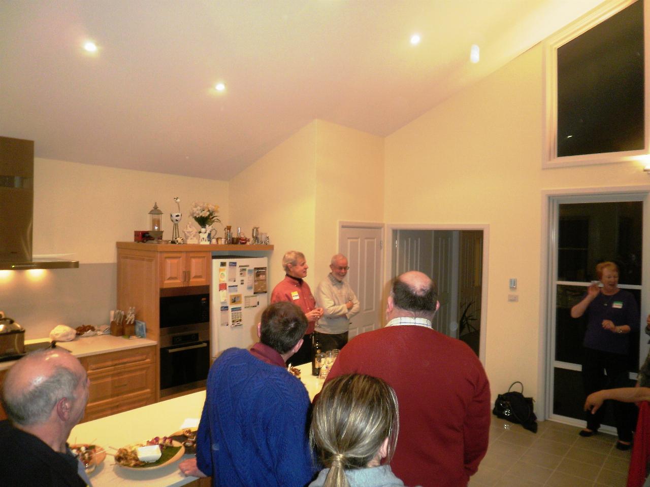 Back view of people listening to speeches