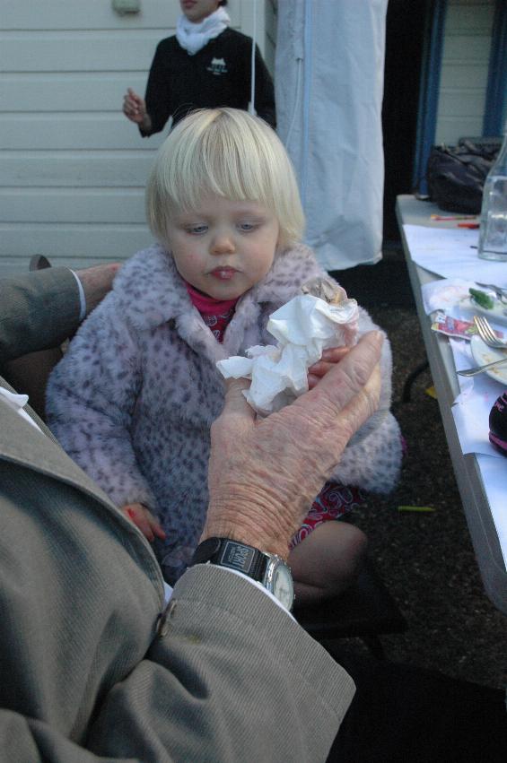 Little girl with paddle pop and tissue