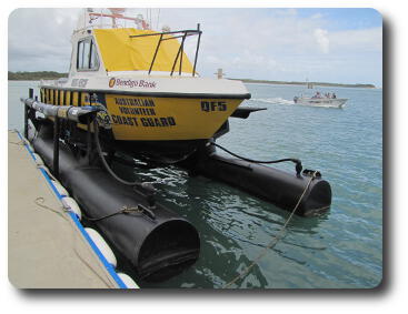 Boat sitting out of water on plastic tube frame