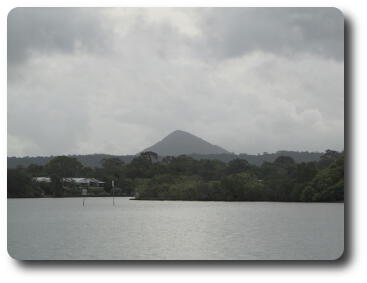 Pyramid shaped mountain beyond the river