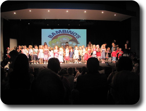 50 children on stage, and a few adults to help along