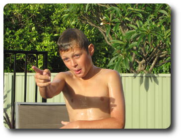 Boy pointing his finger to make a point