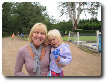 Mother holding 2 year old child